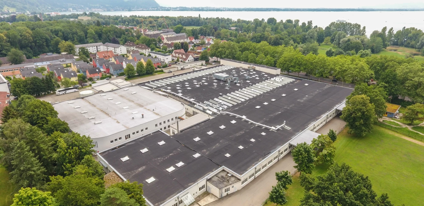 Herzliche Einladung: Am 9. Juli werden die städtebaulichen Entwürfe zur Zukunft des Zechwald-Areals vorgestellt und der Gewinner gekürt. Quelle: Rhomberg Bau