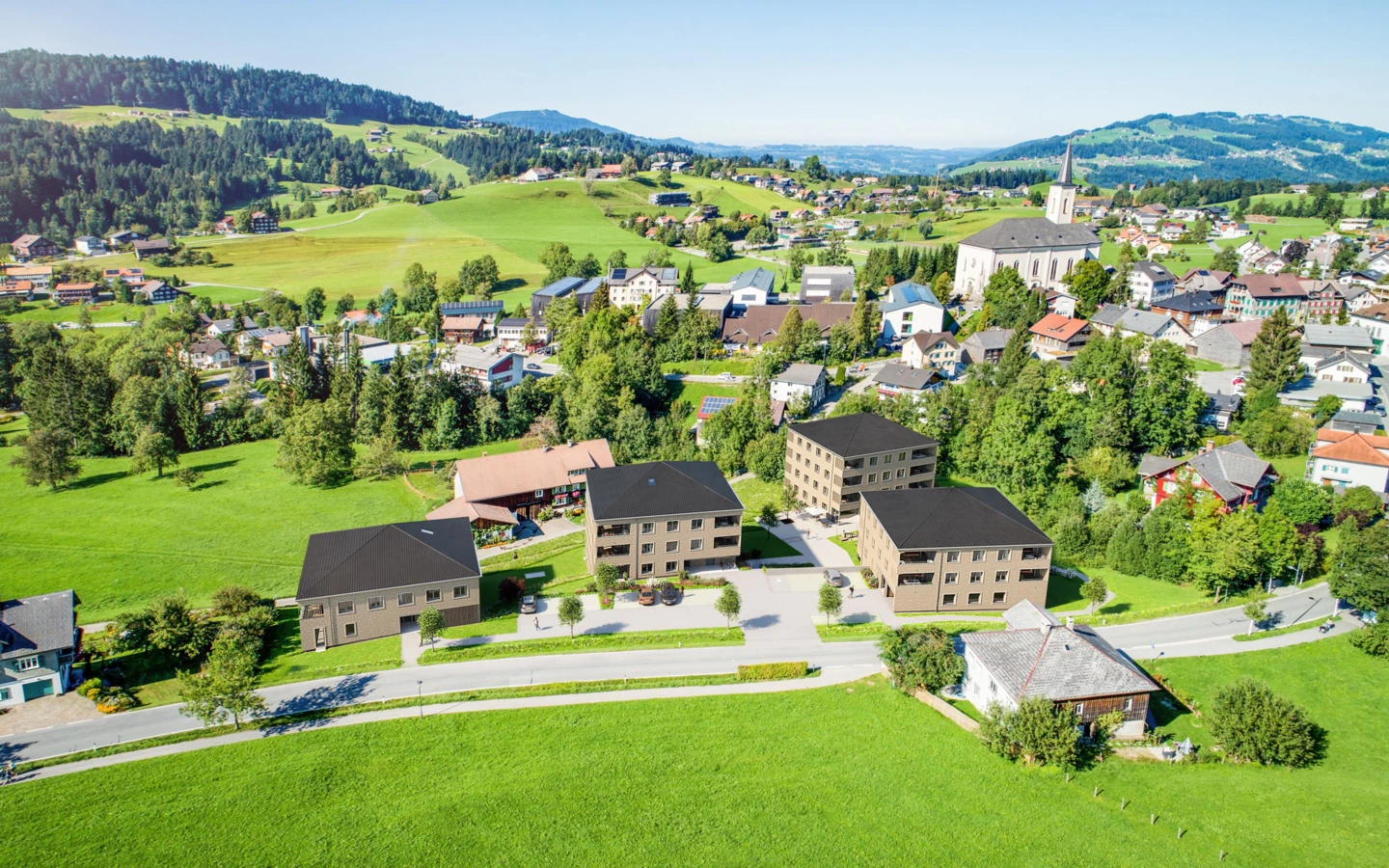 Wird sich harmonisch in die Umgebung einfügen: Das neue Wohnquartier Schwarzen von Sohm in Alberschwende. Bildnachweis: Hof 437 – Thomas Knapp