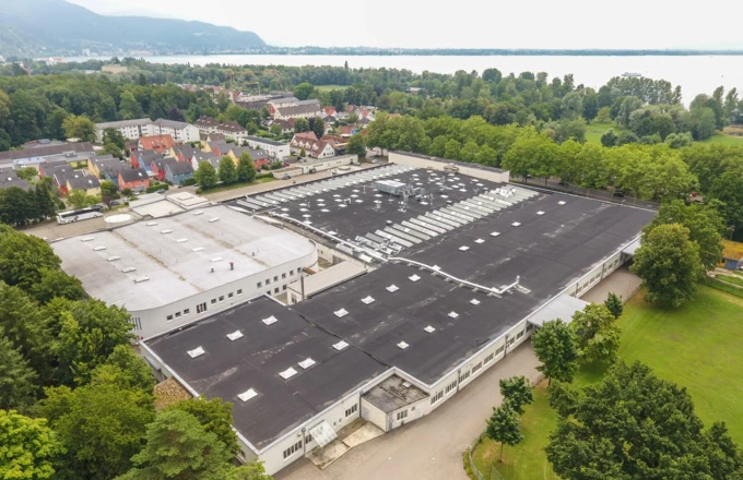 Herzliche Einladung: Am 9. Juli werden die städtebaulichen Entwürfe zur Zukunft des Zechwald-Areals vorgestellt und der Gewinner gekürt. Quelle: Rhomberg Bau